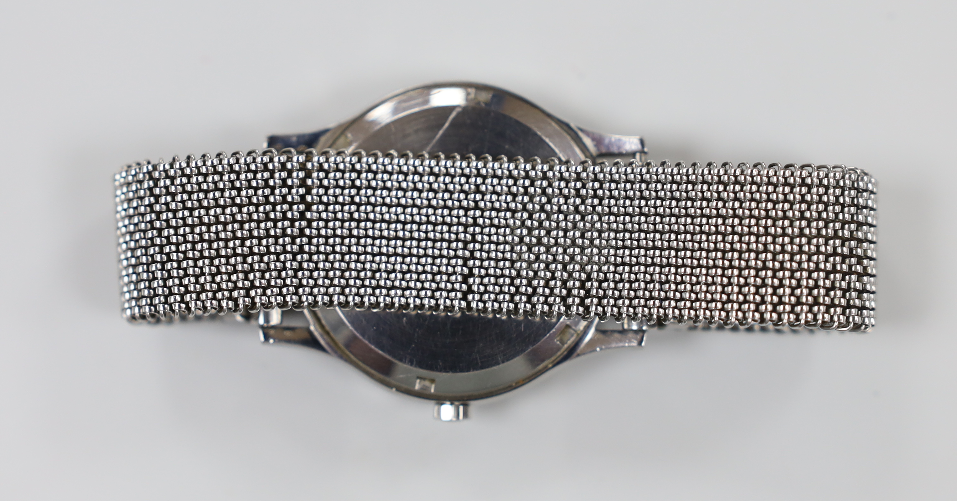 A gentleman's stainless steel Omega Constellation Electronic F300 Hz wrist watch, on an associated flexible strap.